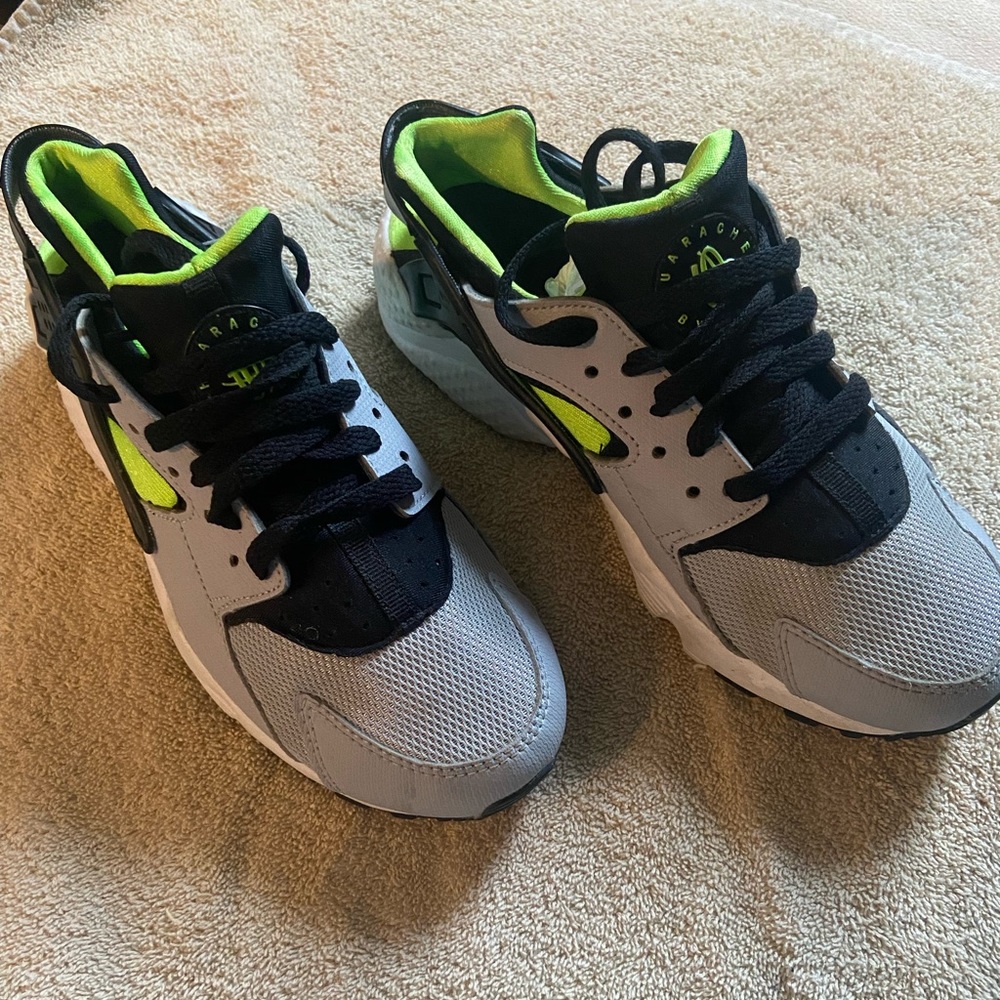 Grey, black, and green huaraches.